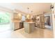 Bright kitchen features stainless steel appliances and tile backsplash, adding a modern touch at 8772 W Evergreen Dr, Columbus, IN 47201