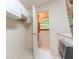 Laundry area featuring cabinetry and tile floor at 8772 W Evergreen Dr, Columbus, IN 47201