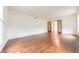 Spacious living room featuring hardwood floors and French doors at 8772 W Evergreen Dr, Columbus, IN 47201