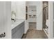 Modern bathroom features a double sink vanity, walk-in closet, and glass-enclosed shower at 8853 Alexander Ridge Dr, McCordsville, IN 46055