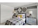 Well-lit bedroom featuring an industrial style bed frame and matching side tables at 8853 Alexander Ridge Dr, McCordsville, IN 46055