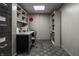 Office space features a desk, storage cabinets and built-in bookshelves at 8905 Washington Blvd West Dr, Indianapolis, IN 46240
