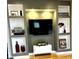 Stylish living room featuring built-in shelving and a contemporary media center at 902 Woodlawn Ave, Indianapolis, IN 46203