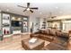 Open-concept living area with hardwood floors, comfortable seating, and modern decor throughout at 902 Woodlawn Ave, Indianapolis, IN 46203