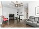 Open-concept living room featuring a wet bar and entertainment area, perfect for gatherings at 902 Woodlawn Ave, Indianapolis, IN 46203