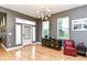 Inviting living area boasts hardwood floors, modern lighting, and stylish decor, perfect for entertaining at 902 Woodlawn Ave, Indianapolis, IN 46203