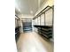 Large walk-in closet offers ample storage with adjustable shelving and drawers at 902 Woodlawn Ave, Indianapolis, IN 46203