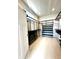 Spacious walk-in closet with customizable shelving and storage system at 902 Woodlawn Ave, Indianapolis, IN 46203