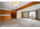 Open-concept living space with view into the kitchen and a lot of natural light at 924 N Devon Ave, Indianapolis, IN 46219