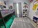 Spacious bedroom with carpet, a bunk bed, and whimsical decor creating a cozy atmosphere at 9507 Colony Pointe E Dr, Indianapolis, IN 46250