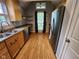 Well-lit kitchen with wood cabinets, stainless steel appliances, and ample countertop space at 9507 Colony Pointe E Dr, Indianapolis, IN 46250