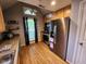 Bright kitchen featuring stainless steel appliances, oak cabinetry, and modern finishes at 9507 Colony Pointe E Dr, Indianapolis, IN 46250