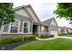 Charming single-story home with well-kept landscaping, featuring brick accents and a convenient two-car garage at 9741 Haughton Ln, McCordsville, IN 46055
