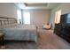Serene main bedroom featuring carpeted floors, chair, dresser and ample natural light at 9741 Haughton Ln, McCordsville, IN 46055