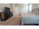 Spacious main bedroom features a dresser, carpeted floors, and an attached bathroom at 9741 Haughton Ln, McCordsville, IN 46055