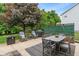 Inviting backyard featuring a patio, outdoor seating, a grill, and privacy landscaping at 9756 Brook Meadow Dr, McCordsville, IN 46055