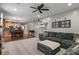 Spacious living room with an open floor plan connected to the kitchen and dining area at 9756 Brook Meadow Dr, McCordsville, IN 46055