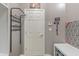 Entryway mudroom with coat rack, key holder, and storage; practical and organized at 9756 Brook Meadow Dr, McCordsville, IN 46055