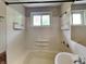 Bathroom featuring shower/tub combo and window at 988 Westfield Rd, Noblesville, IN 46062