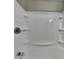 Clean bathroom with new shower/tub combo at 988 Westfield Rd, Noblesville, IN 46062