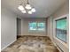 Dining room filled with natural light with two windows at 988 Westfield Rd, Noblesville, IN 46062