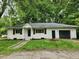 Charming single-story home with a well-maintained yard, front porch, and attached one-car garage at 988 Westfield Rd, Noblesville, IN 46062