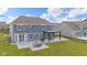 The backyard is a great place to entertain and relax in with a patio and pergola at 9917 Gallop Ln, Fishers, IN 46040