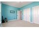 Comfortable bedroom boasting ample closet space and neutral carpet at 9917 Gallop Ln, Fishers, IN 46040
