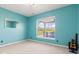 Bright bedroom offering a beautiful outdoor view through a large window at 9917 Gallop Ln, Fishers, IN 46040
