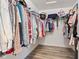 Spacious walk-in closet with ample hanging space and shelving provides plenty of storage at 9917 Gallop Ln, Fishers, IN 46040