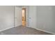 This bedroom has neutral carpet and an entry to the bathroom at 1002 Collier St, Indianapolis, IN 46241