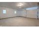 A large open garage with concrete floors and plenty of space at 1002 Collier St, Indianapolis, IN 46241