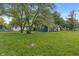 Expansive lawn surrounding the home, highlighting its curb appeal and outdoor space at 1002 Collier St, Indianapolis, IN 46241