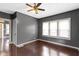 Bedroom with hardwood floors and natural light from windows at 1021 W 37Th St, Indianapolis, IN 46208