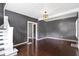 Inviting living room with hardwood floors and views into an adjacent room at 1021 W 37Th St, Indianapolis, IN 46208