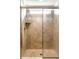 Updated bathroom shower with tile surround, glass door, and modern fixtures at 1065 Park Ct, Avon, IN 46123