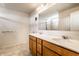 Bathroom with double sink vanity, large mirror, and shower at 1065 Park Ct, Avon, IN 46123