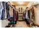 A walk-in closet that provides ample storage space with a variety of shelving and hanging options to keep things organized at 1065 Park Ct, Avon, IN 46123