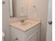 Bathroom with single vanity and sink plus simple mirror and towel rack at 10722 Mistflower Way, Indianapolis, IN 46235