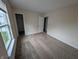 Neutral bedroom featuring carpeted floors at 10722 Mistflower Way, Indianapolis, IN 46235