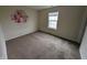 Bedroom featuring carpeted floors at 10722 Mistflower Way, Indianapolis, IN 46235