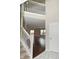 Bright foyer with staircase leading to upper level and a view of the living area at 10722 Mistflower Way, Indianapolis, IN 46235