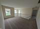 Upstairs hallway featuring neutral paint and carpeting at 10722 Mistflower Way, Indianapolis, IN 46235