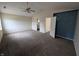 Large main bedroom with vaulted ceilings, carpeted floors, and ensuite bathroom access at 10722 Mistflower Way, Indianapolis, IN 46235