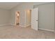 The primary bedroom offers a view of the ensuite bath, enhancing its appeal at 10722 Mistflower Way, Indianapolis, IN 46235