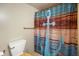 Bathroom featuring a toilet and anchor-themed shower curtain at 10758 W State Road 142, Quincy, IN 47456