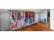 A walk-in closet featuring a storage rack filled with clothing at 10758 W State Road 142, Quincy, IN 47456