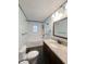 Clean, updated bathroom featuring a shower-tub combo and vanity with storage at 108 N A St, Elwood, IN 46036