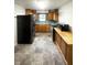 Functional kitchen with ample cabinet space and essential appliances included at 108 N A St, Elwood, IN 46036