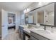 Elegant bathroom with dual vanities, and modern fixtures at 1085 Bevy Blvd, Danville, IN 46122